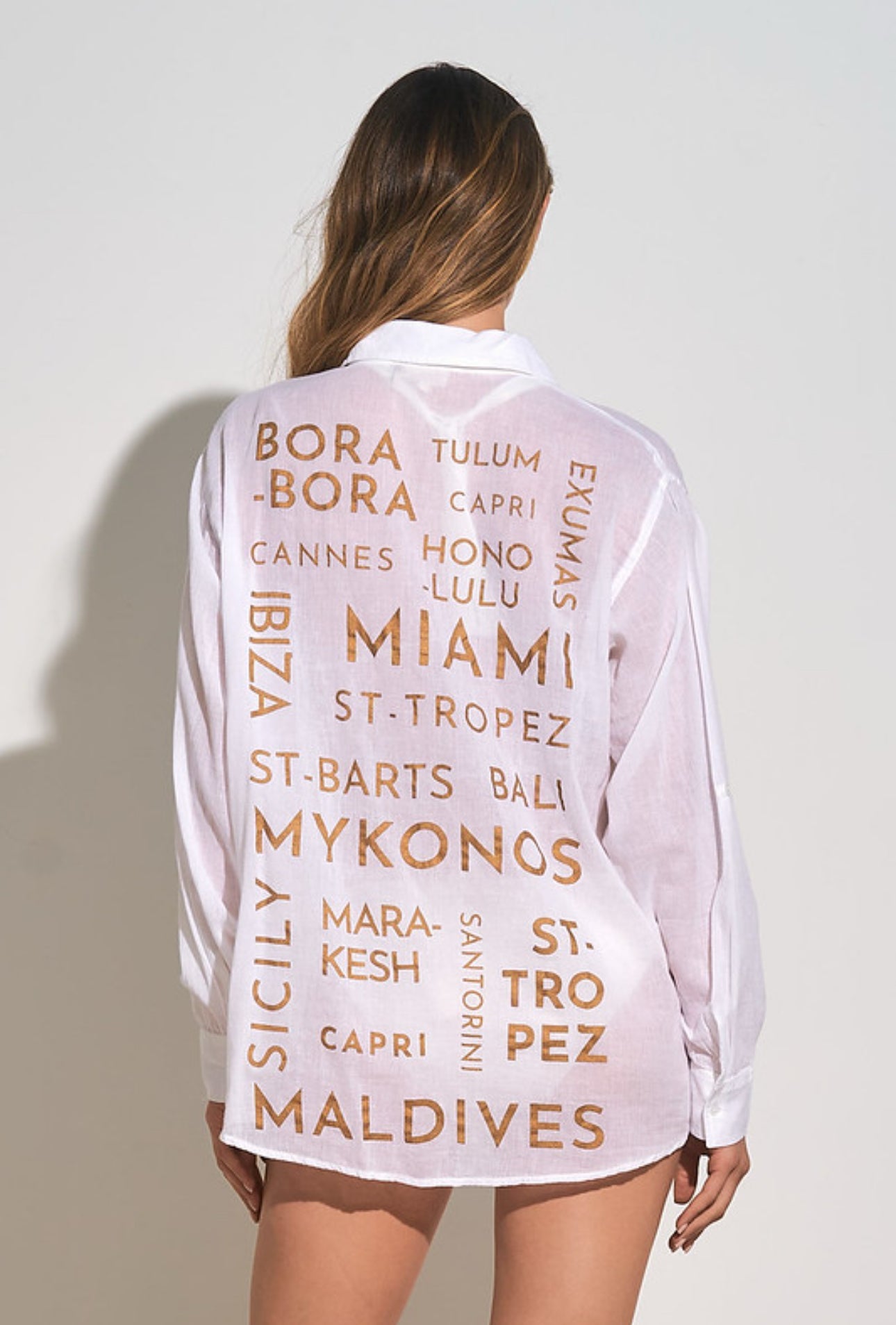 WHITE BUTTON DOWN TOP WITH GOLD WRITING