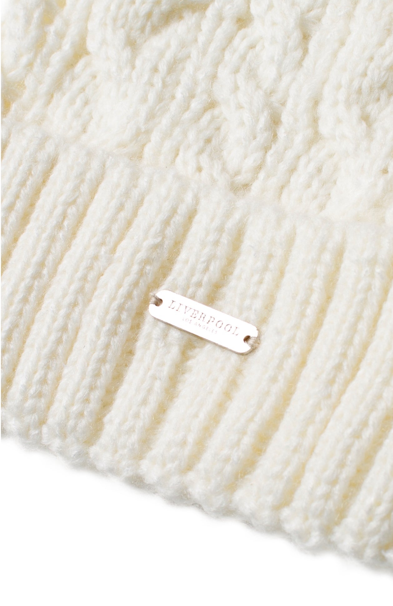CABLE KNIT BEANIE WITH FAUX FUR