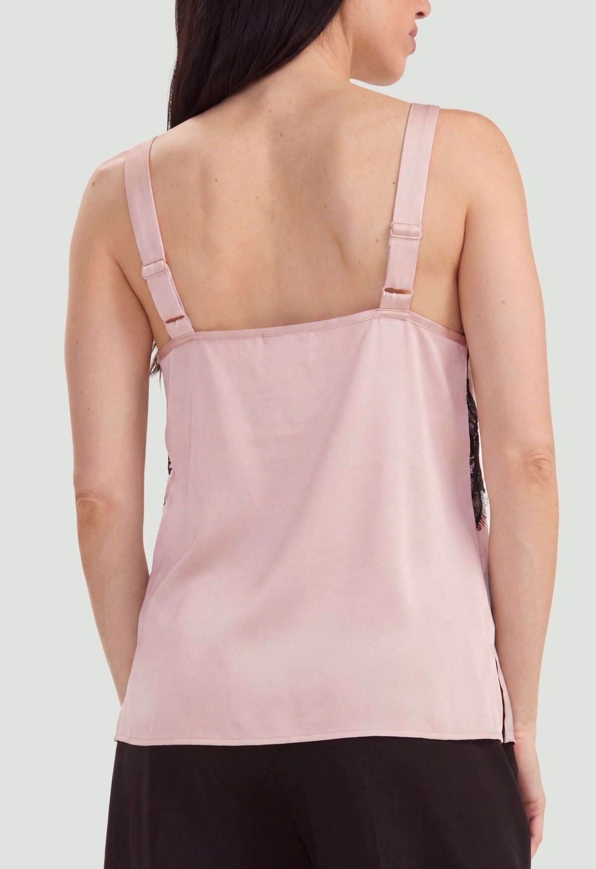 Sleeveless pin tucked woven top with ruffles in pink with black lace