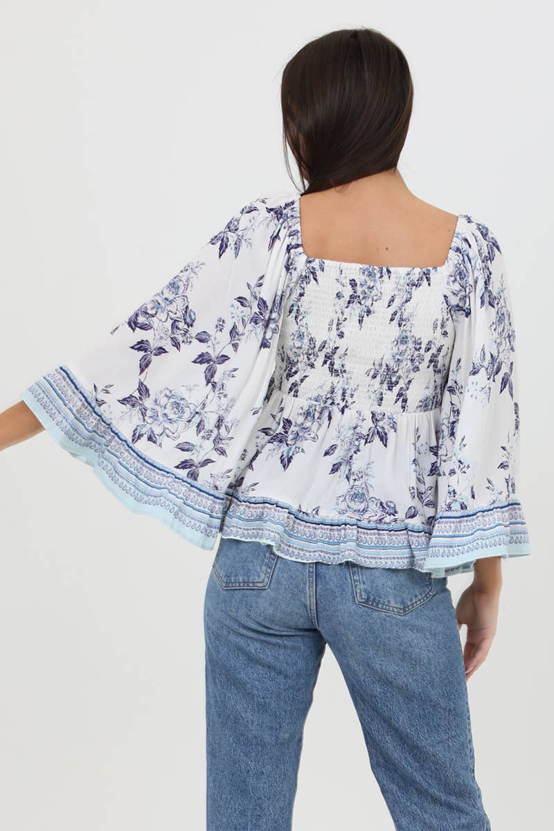 LONG FLARE SLV TOP WITH SMOCKED BODICE