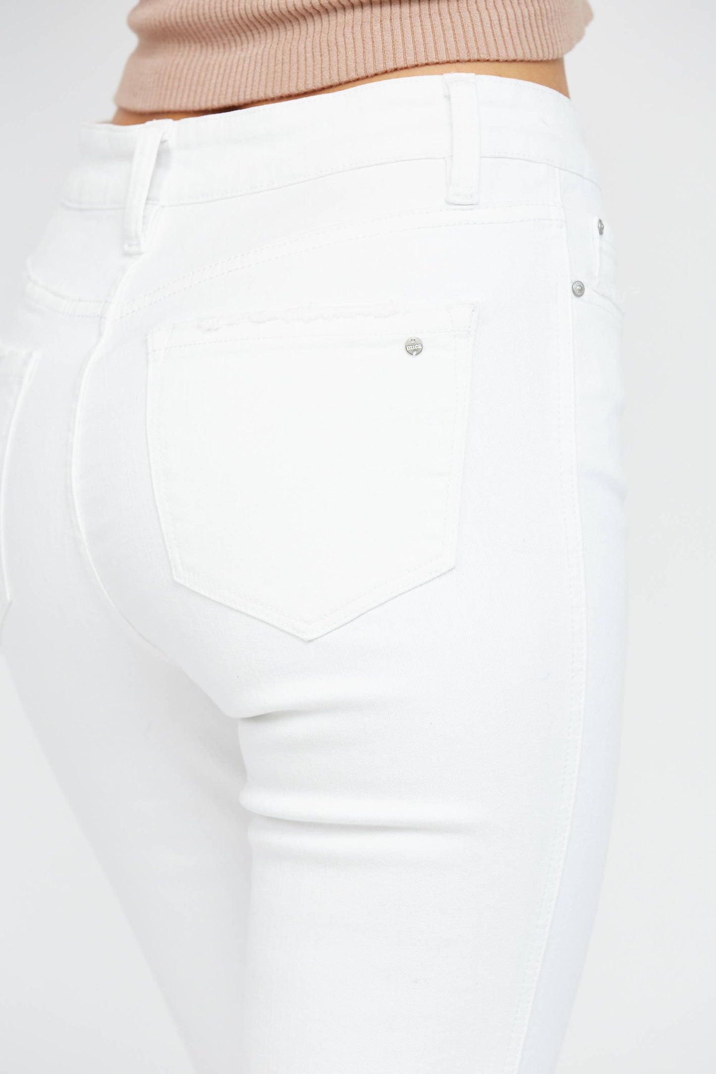 HIGH RISE CROP FLARE WITH UNEVEN HEM