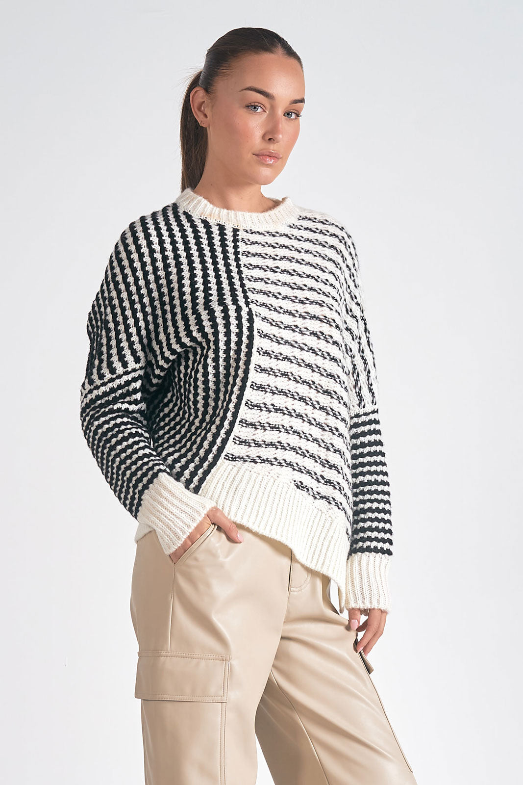 ASYMMETRICAL BLACK/CREAM SWEATER