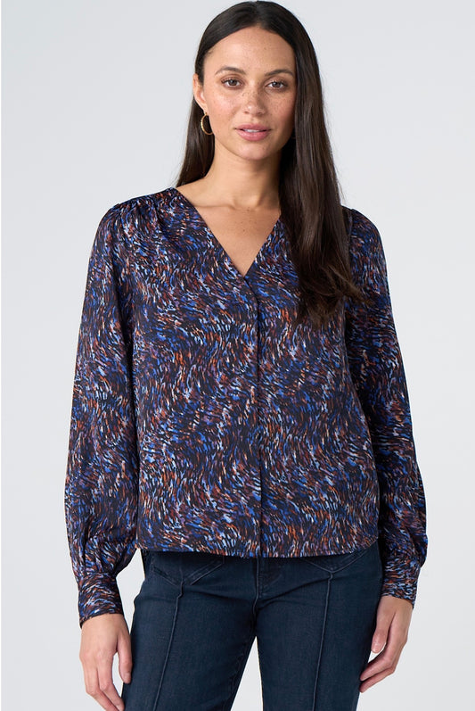 Long sleeve button front woven blouse