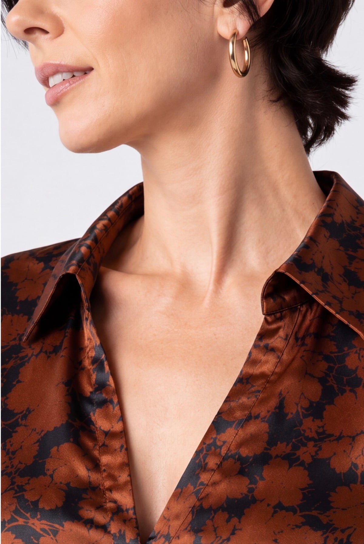 Long sleeve button front woven blouse
