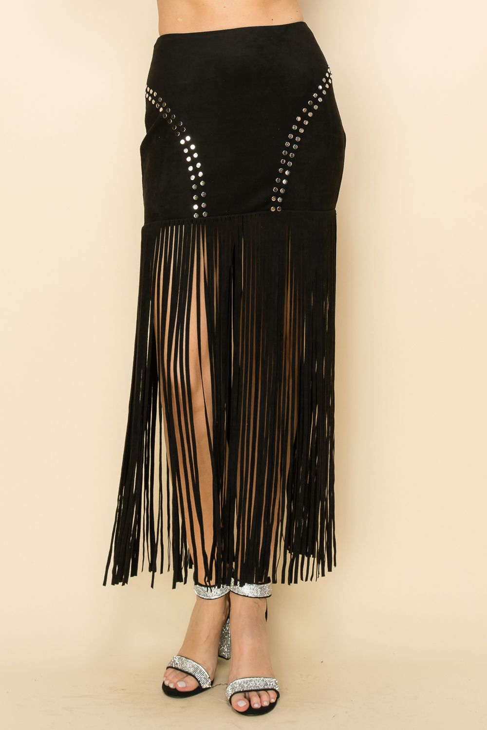 High-rise suede knit maxi skirt with studs and long fringe in Black