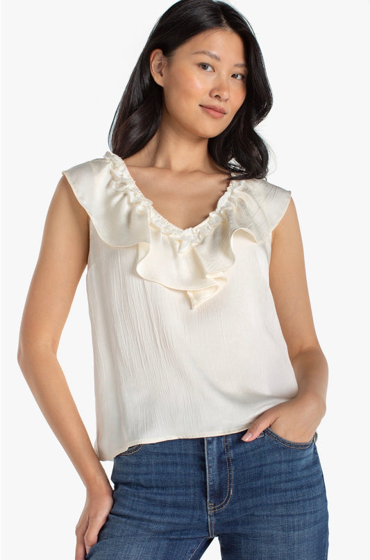 Ruffle front sleeveless woven knit top in French vanilla