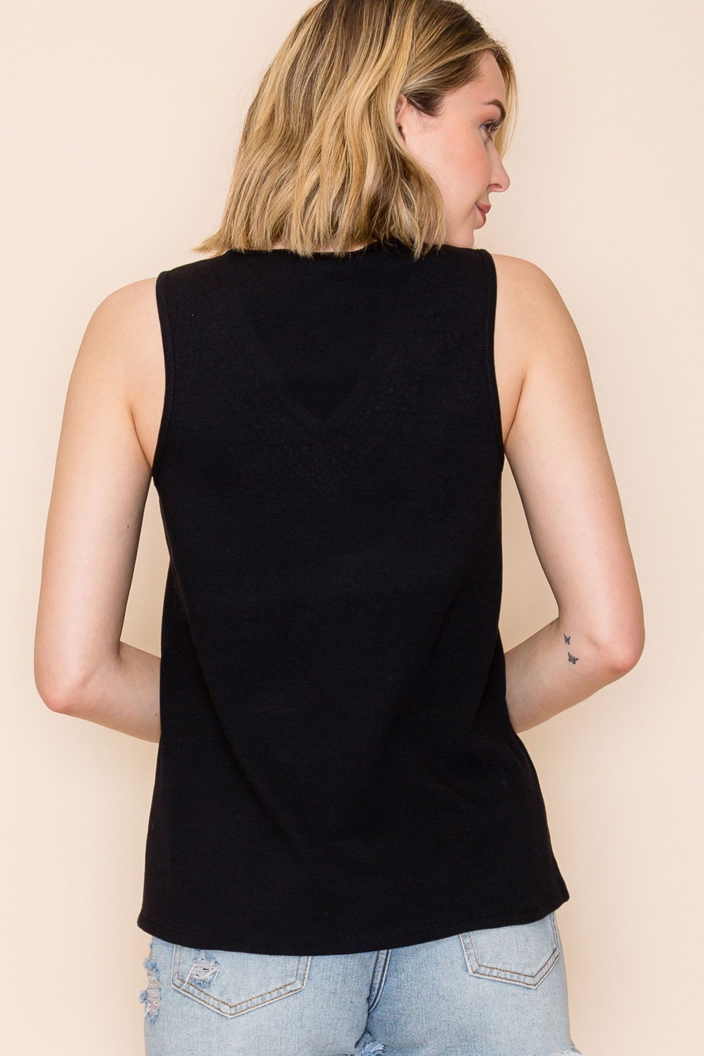 Rhinestone deep detail at V-neckline