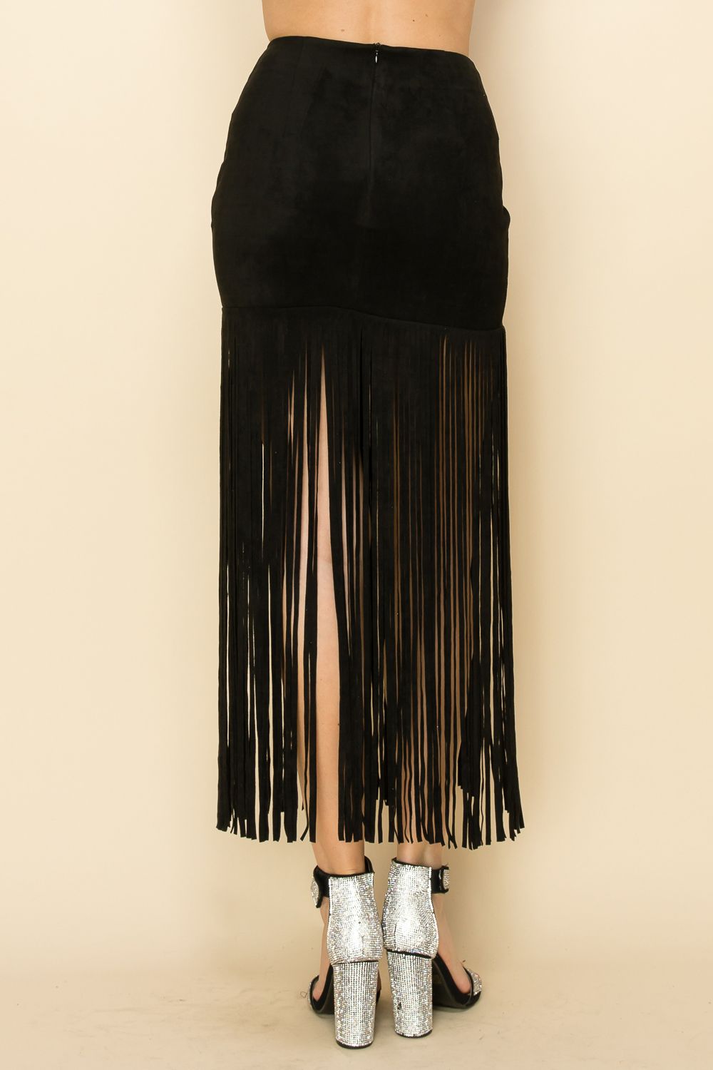 High-rise suede knit maxi skirt with studs and long fringe in Black
