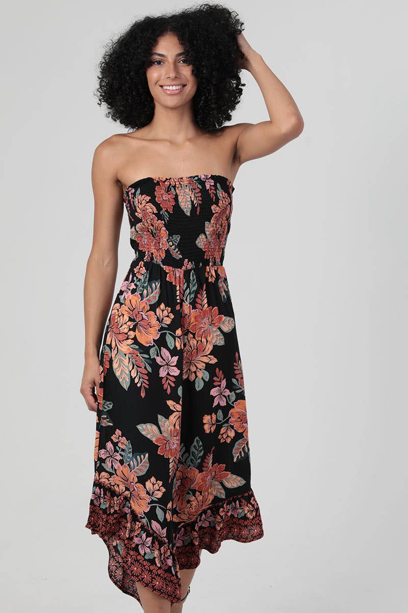 SMOCKED BODICE STRAPLESS HANKY HEM JUMPSUIT