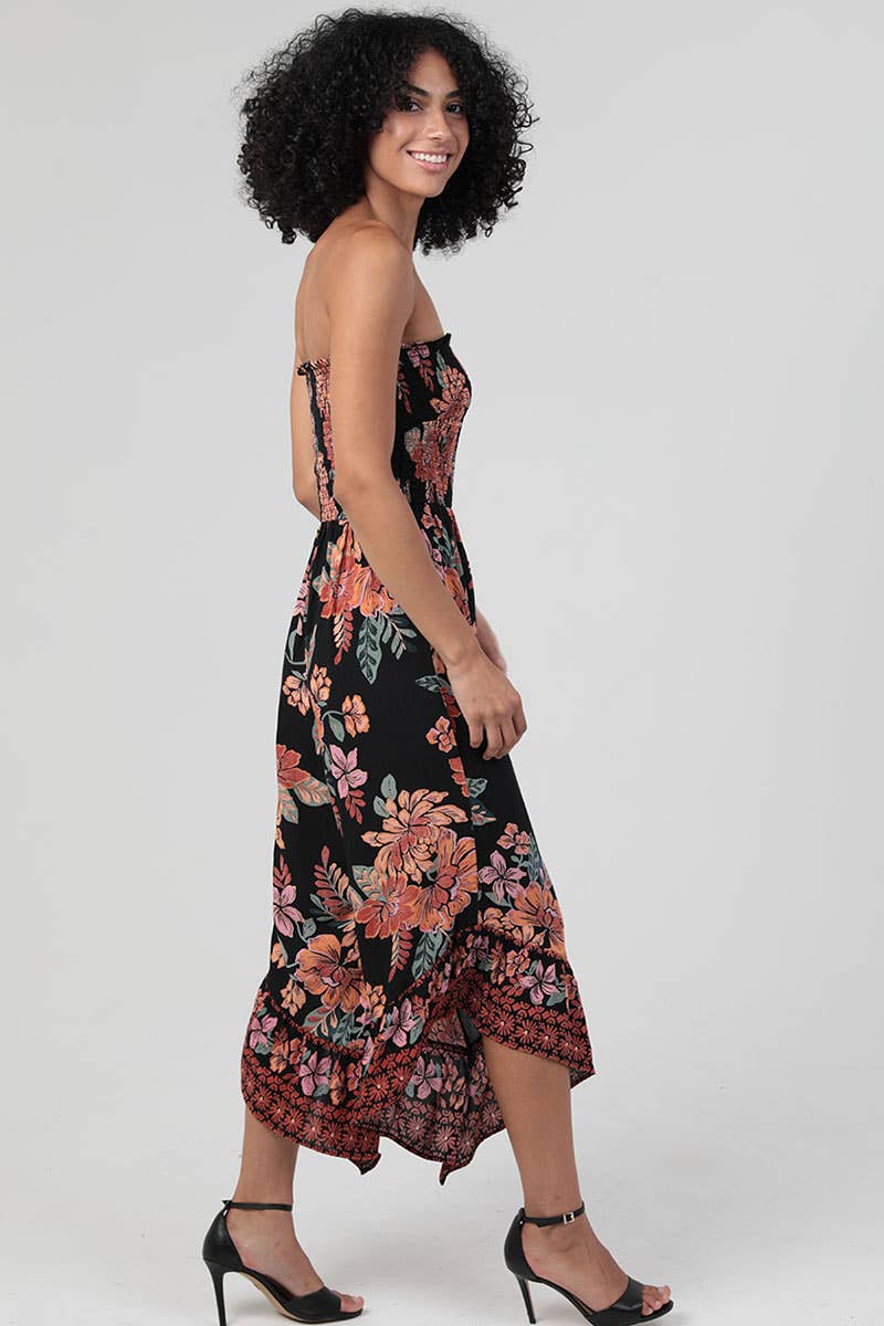 SMOCKED BODICE STRAPLESS HANKY HEM JUMPSUIT