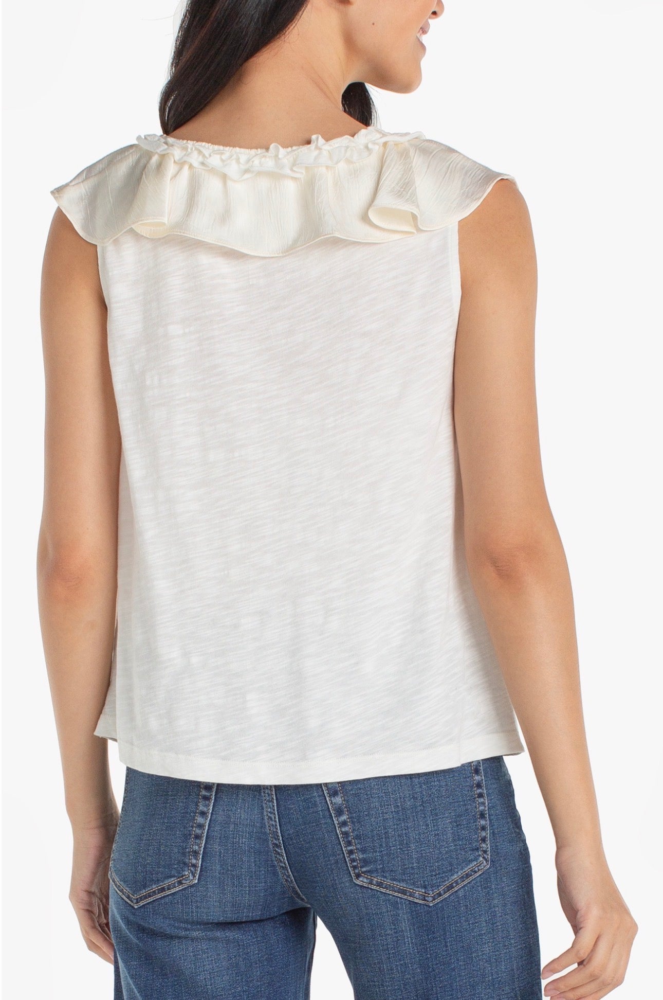 Ruffle front sleeveless woven knit top in French vanilla