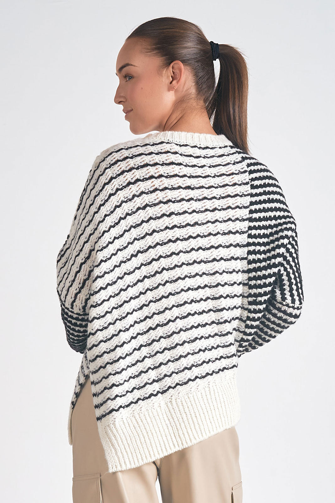 ASYMMETRICAL BLACK/CREAM SWEATER