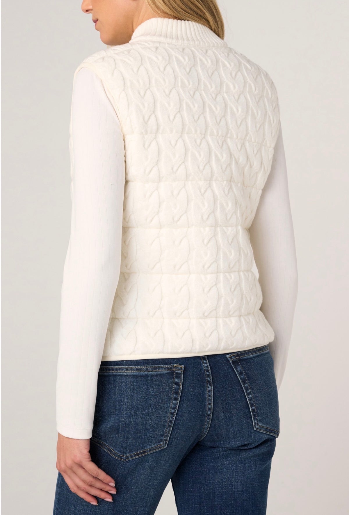 Sleeveless reversible, zip front quilted vest
