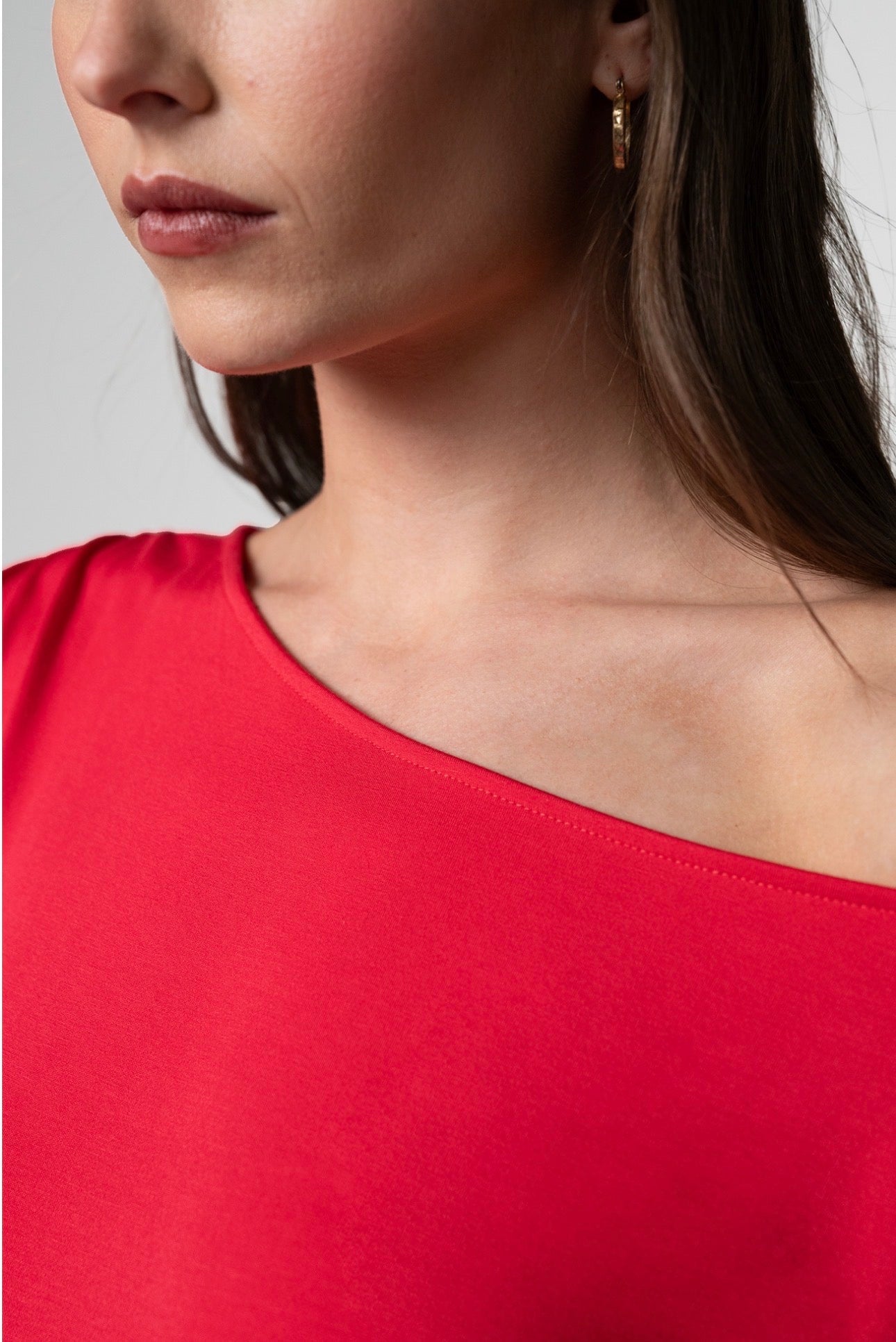 Short sleeve asymmetric off shoulder knit top in cherry rose