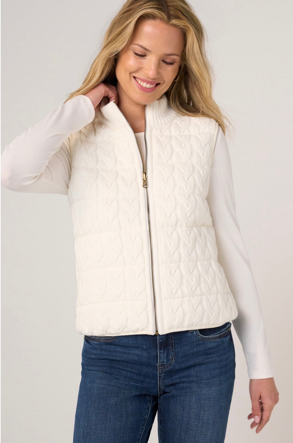 Sleeveless reversible, zip front quilted vest
