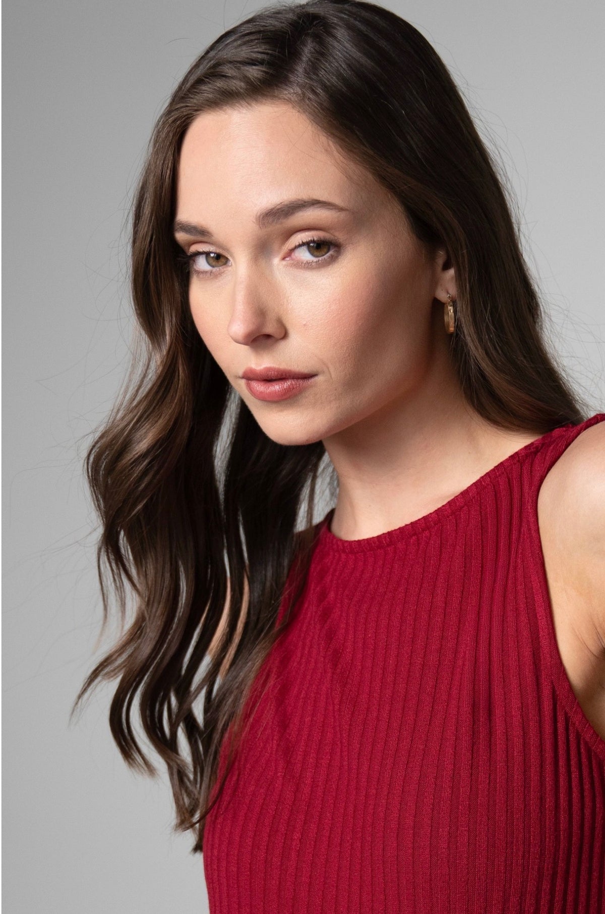 Sleeveless high boat, neck knit top in cranberry