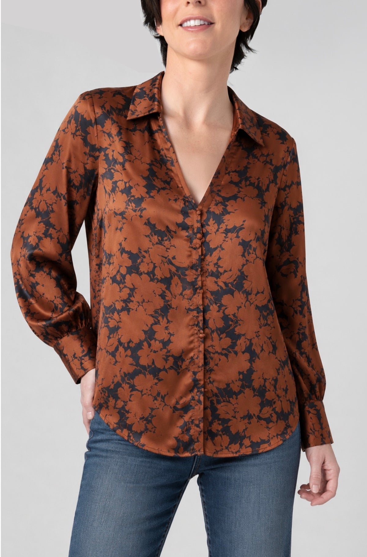 Long sleeve button front woven blouse
