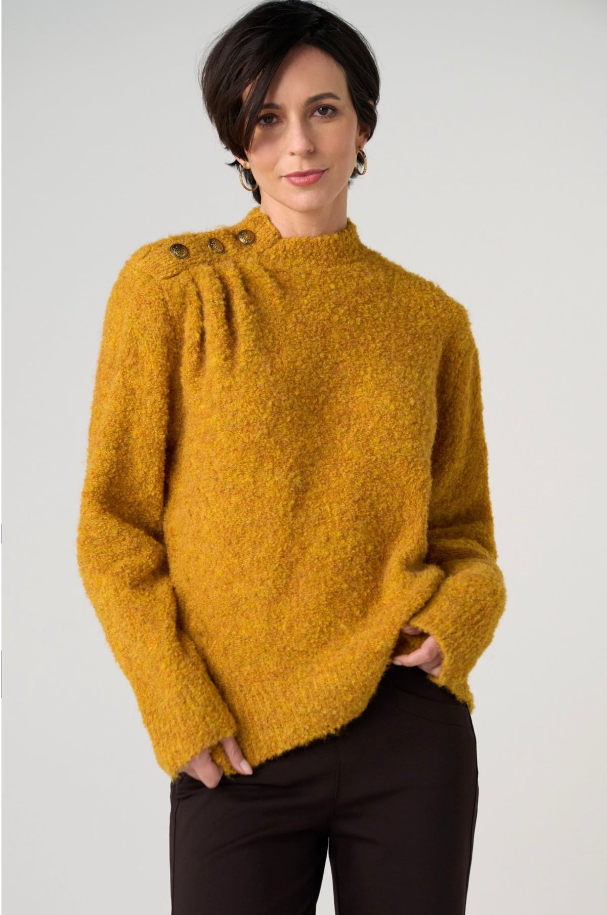 Long sleeve mock neck sweater with buttons on one side of shoulder