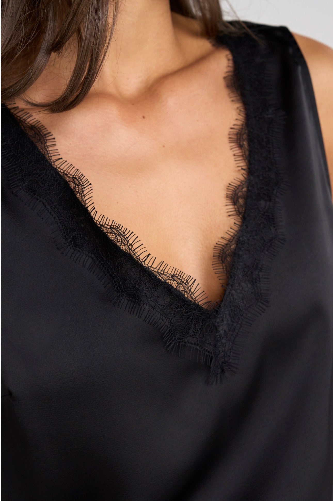V-neck woven tank with lace trim in black