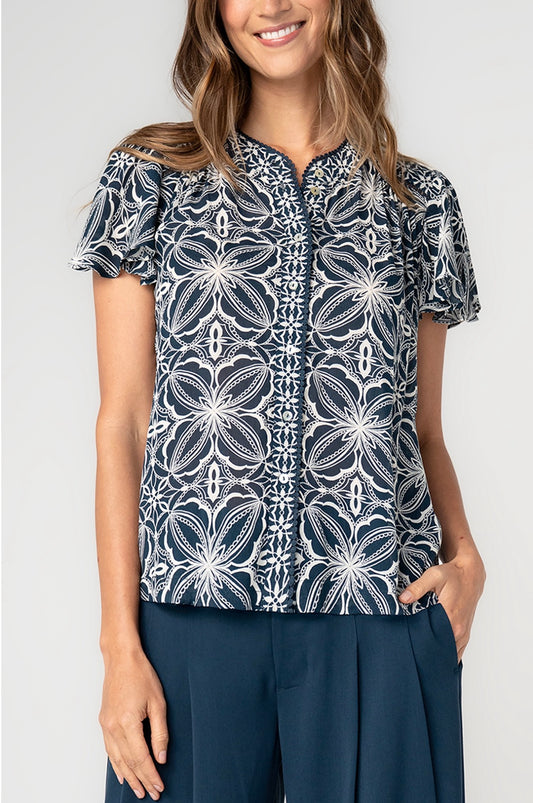 Navy and white flutter sleeve with button accents