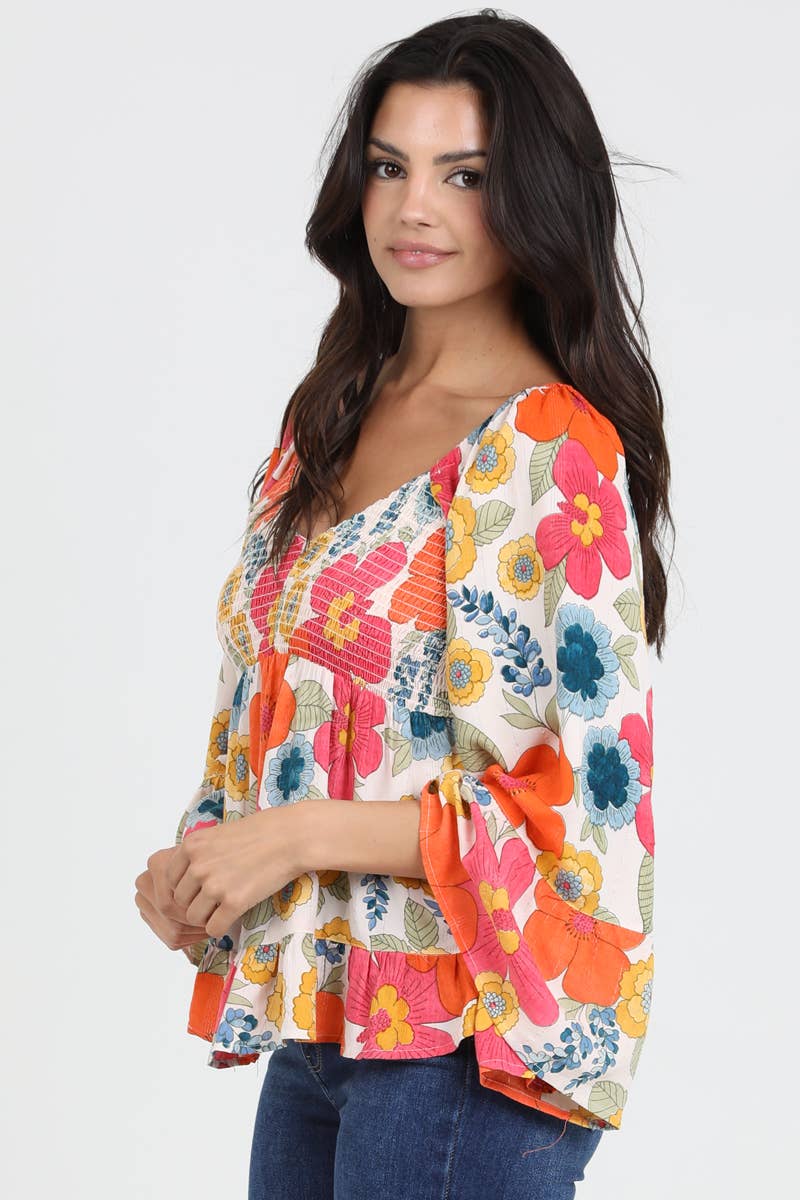 V NECK SMOCKED BUST WIDE BELL SLEEVE FLORAL BLOUS