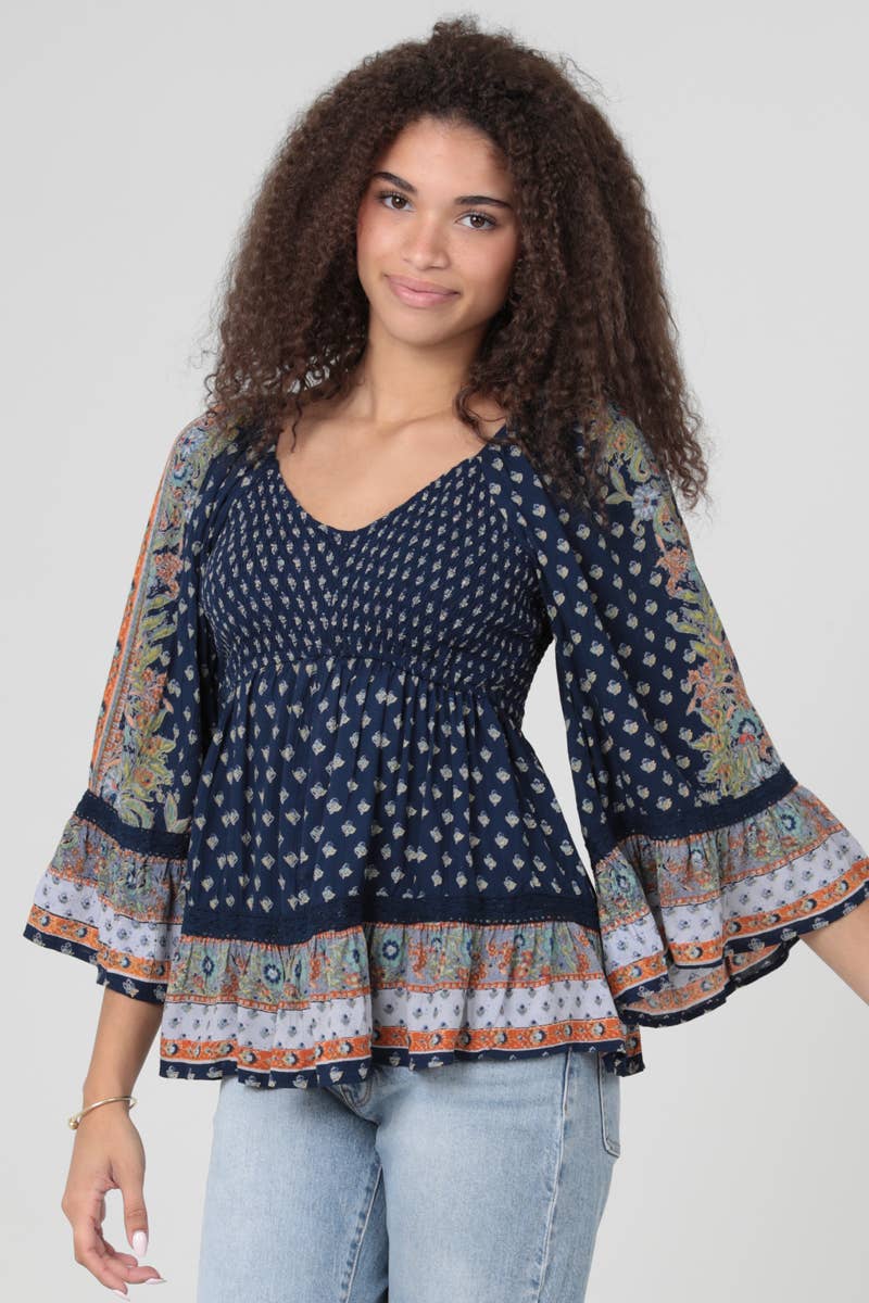 V NECK SMOCKED BUST WIDE BELL SLEEVE PRINTED TOP