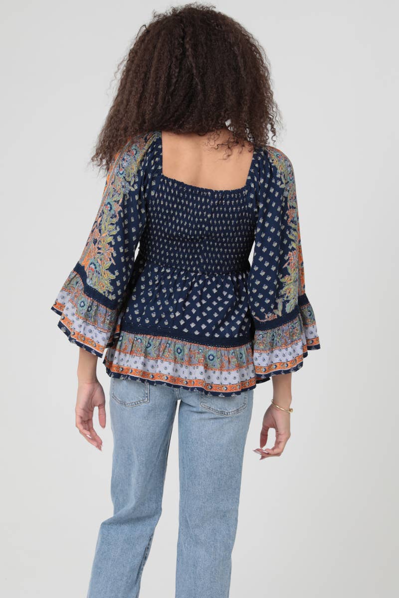 V NECK SMOCKED BUST WIDE BELL SLEEVE PRINTED TOP
